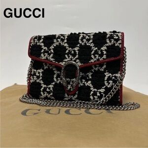 Gucci Black and White Crossbody Bag with Red Accents